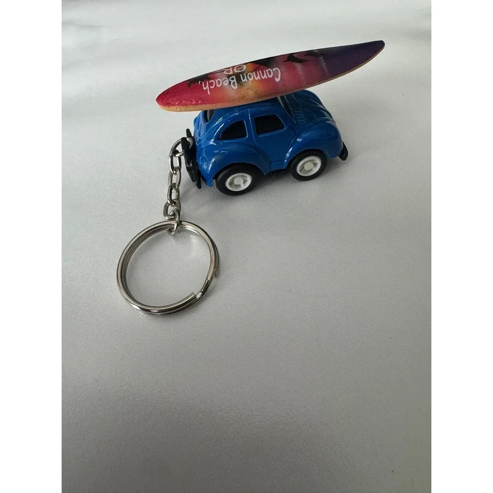 Cannon Beach‎ Oregon Blue Beetle Bug Style Car Keychain with Surfboard Souvenir